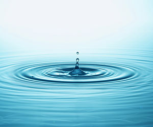 WhiteJack - Shutterstock - 339197108 Ripple effect concept with drop of water falling into pool